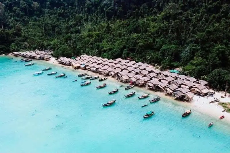 Boats lined up beside a Surin island beach